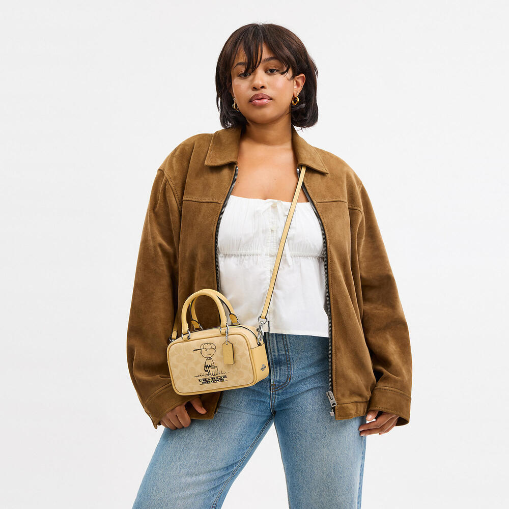 Coach X Peanuts Satchel Crossbody Bag In Signature Canvas With Charlie Brown - Picture 7 of 14